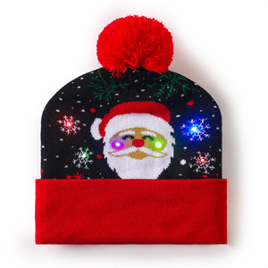 Bonnet de Noël unisexe en tricot avec pompon rouge et yeux lumineux à LED - Product Image 1