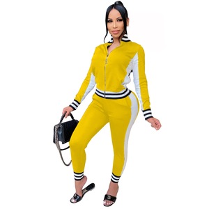 Ensemble de survêtement sportif pour femme, jaune et blanc, à blocs de couleur, manches longues, fermeture éclair, col montant, coupe ajustée, toutes saisons, tricoté - Product Image 1