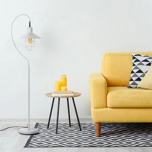 Lampe sur pied moderne noire en forme d'arc avec base en marbre pour éclairage d'ambiance à côté du canapé - Product Image 1