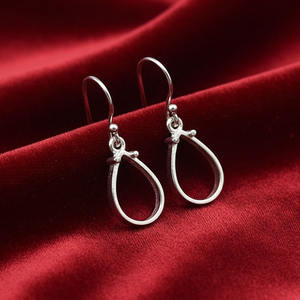 Pendientes de plata de ley 925 con forma de pera y 4 puntas, diseño abierto, de Jessica Creation, joyería moderna para cenizas o leche materna - Product Image 1