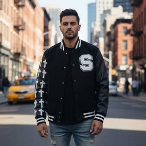 Chaqueta Varsity Negra de Lana Estilo High Street |   Chaqueta Varsity Personalizada con Mangas Cruzadas, Parche de Letras de Chenille y Cuello Alto - Product Image 1