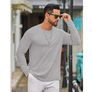 T-shirts décontractés à manches longues pour hommes européens et américains, col rond, motif gaufré, couleur unie, design épuré, printemps automne, pour la gym et le club - Product Image 4