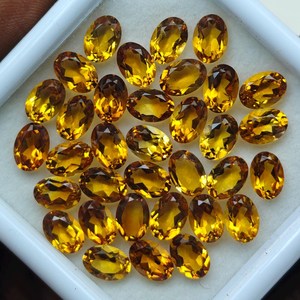 พลอยซิทรินแท้ธรรมชาติทรงรีขนาด 7x5 มม. สีเหลืองทองเจียระไน แบรนด์ HASNAIN GEMS สำหรับทำแหวน ต่างหู และเครื่องประดับ - Product Image 3