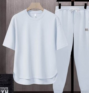 Ensemble deux pièces décontracté pour homme, couleur unie, t-shirt à col rond à manches courtes, pantalon long en tricot respirant, vêtements d'été - Product Image 2