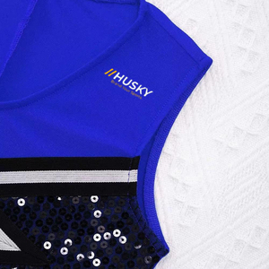 Tenues de cheerleading personnalisées HUSKY SPORTSWEAR pour filles et adultes, avec logo frontal imprimé par transfert thermique, couleurs variées pour les équipes et les compétitions. - Product Image 5