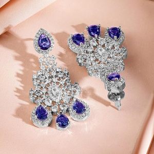 Parure de bijoux ethniques plaqués or avec collier, boucles d'oreilles et coiffe à motif floral pour femme, idéale pour les mariages et la mode - Product Image 3