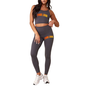 Conjunto de Yoga de 2 Piezas para Mujer, Tallas Grandes, Color Sólido, con Logotipo Personalizado OEM, Transpirable, de Secado Rápido, Ecológico, Sin Costuras, Bra Deportivo y Leggings - Product Image 1