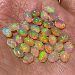 Lot de cabochons d'opale jaune éthiopienne Welo Fire Opal, pierres brutes de forme ovale, de 6x4mm à 8x10mm, pour la création de bijoux - Product Image 6