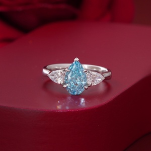 Vivid Blue 1.61 CT Pear Cut Lab Grown Diamond Three Stone <b>Ring</b> in <b>14K</b> White <b>Gold</b> with Prong Setting - Product Image 1