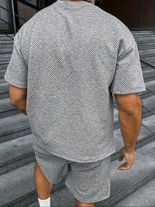 Ensemble de sport décontracté deux pièces pour homme avec t-shirt respirant à manches courtes et short à cordon de serrage pour l'hiver - Product Image 2