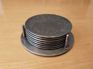 Stylish Hammered Design <b>Silver</b> Floral Metal Drink Coaster Set With Decorative Holder For <b>Coffee</b> <b>Table</b> Bar And Festive Decor - Product Image 1