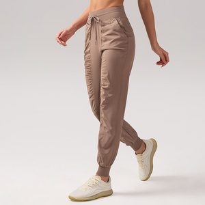 กางเกงวอร์มจ็อกเกอร์ทรงหลวมระบายอากาศได้ดีสำหรับผู้หญิง มีกระเป๋าเก้าจุด กระชับสัดส่วน เหมาะสำหรับวิ่ง ออกกำลังกาย โยคะ ผลิตจากผ้าสแปนเด็กซ์/ไนลอน - Product Image 3