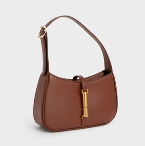 Sac en forme de croissant de prune foncé avec une magnifique poignée sculptée en or. Mode haut de gamme disponible à prix de gros. - Product Image 3