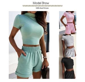 Conjunto de dos piezas de verano para mujer, chándal corto ajustado informal con cuello redondo y bolsillos de cintura elástica, pantalones cortos sólidos sueltos - Product Image 2