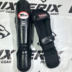 Best Leather Shin Guard Muay Thai Boxing Custom Leg Protection Shin Pad with Hook Loop Closure Universal Fit Basic Protection - Product Image 1