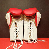 Gants de boxe à lacets de qualité compétition pour hommes et femmes, gants professionnels pour combattants avec coutures renforcées et fermeture de pouce.