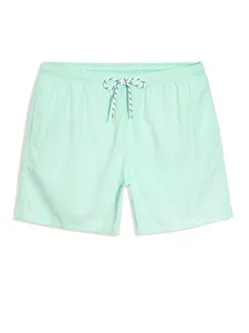 Short de plage pour homme vert menthe uni à taille élastiquée, séchage rapide, en polyester tissé, taille mi-haute, longueur courte - Product Image 1