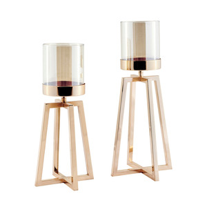 Ensemble de 2 bougeoirs modernes en or rose, supports géométriques en métal avec chambres à flamme en verre pour une décoration de table luxueuse - Product Image 1