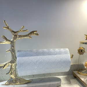 Hermoso portarrollos de papel artístico con forma de árbol dorado, montado sobre una elegante plataforma de mármol. Disponible a precios de mayorista. - Product Image 1