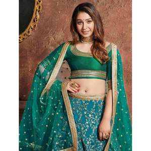 Teal Green <b>Sequins</b> <b>Art</b> Silk Wedding Wear Lehenga Choli - Product Image 1