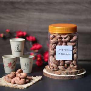 Noix de cajou grillées séchées de qualité supérieure du Vietnam en pot carré avec couvercle jaune 500g, saveur beurre salé, certifiées ISO - Product Image 4