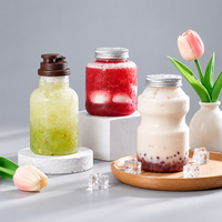 Bouteille de boisson en PET transparente de 500 ml de qualité alimentaire avec bouchon à vis en aluminium personnalisé pour l'emballage de thé au lait, de jus et de soda