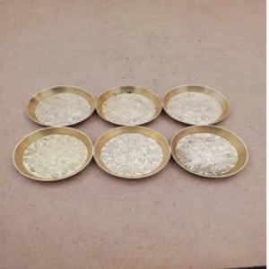 Set of four round brass coasters featuring traditional <b>painted</b> lotus floral artwork, available at wholesale prices. - Product Image 2