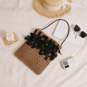 Eleva tu moda de verano con este bolso de hilo natural hecho a mano, decorado con elegantes detalles de lazo negro para mujeres con estilo. - Product Image 2