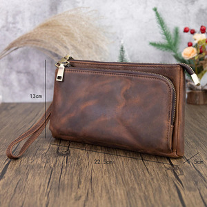 Bolso de mano de cuero de primera calidad con cierre seguro, múltiples ranuras para tarjetas, bolsillo para teléfono y correa desmontable para uso diario. - Product Image 6