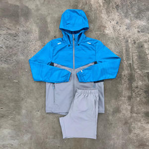 Conjunto Deportivo Personalizado de Dos Piezas para Hombre, Chaqueta Cortavientos Ligera de Nailon con Cierre y Capucha, y Pantalones Cortos - Product Image 4