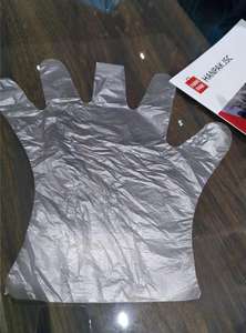 ผลิตถุงมือ HDPE ขายตรงการแปรรูปอาหารการตรวจทางการแพทย์แป้งฟรีถุงมือใสแบบใช้แล้วทิ้ง
