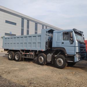 Sinotruck Howo 8x4 ascensore anteriore nuovo 351-450hp RHD autocarro con cassone ribaltabile disponibile per l'esportazione nel prezzo Africa - Product Image 1