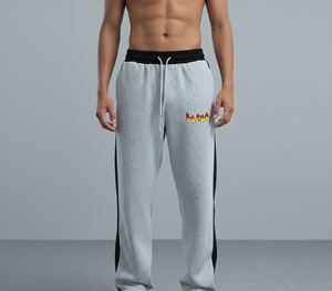 Pantalon de survêtement gris pour homme avec bande latérale noire et logo imprimé flamme, taille élastique avec cordon de serrage, tenue décontractée pour l'automne - Product Image 1
