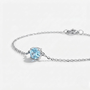 Rhaya Jewels 92.5% Sterling <b>Silver</b> Rhodium Plated Classic Solitaire Blue Topaz Chain Link <b>Bracelet</b> Prong Setting Unisex <b>Children</b> - Product Image 1