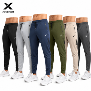 Pantalon de survêtement élastique pour homme avec poches latérales, cordon de serrage, joggers décontractés multicolores, maille respirante, séchage rapide - Product Image 1