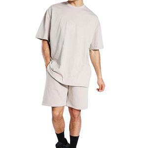 ราคาขายส่ง คอลเลคชั่นล่าสุด เสื้อยืดและกางเกงขาสั้นผู้ชาย สีพื้น ผ้าฝ้าย 100% ชุดเสื้อยืดและกางเกงขาสั้นผู้ชาย - Product Image 1