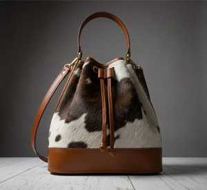 Sac seau hobo unisexe en cuir imprimé vache grande capacité avec fermeture éclair, poignée souple, style vintage, sac à bandoulière - Product Image 1