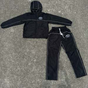Conjunto Deportivo Personalizado para Hombre, Chaqueta y Pantalones Ligeros de Nailon, con Cierre, Cortavientos, Informal, para Correr, Traje Deportivo - Product Image 1