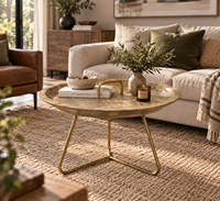 Table basse ronde en bois moderne avec pieds en métal doré, mobilier de salon contemporain, design artisanal