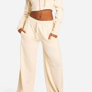 Conjuntos deportivos acampanados para mujer, elegantes, cómodos y relajados, diseñados para un estilo urbano y un atuendo informal diario. - Product Image 3