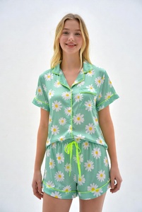 Womens blue star print pajama set with short sleeve button up top and drawstring pants in studio for cute comfortable sleepwear - Product Image 6