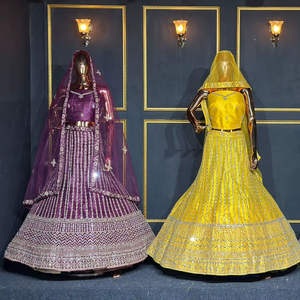 Lehenga Choli de créateur en tissu filet avec broderie Dori, travail miroir Shisha et détails en pierres, disponible en 20 couleurs et 10 modèles élégants - Product Image 1