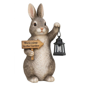 Solar IP65 Rated Polyresin & Plastic Warm White Welcome Bunny Garden Statue with LED Lantern and <b>Battery</b> <b>Backup</b> - Product Image 1