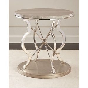 Table d'appoint moderne en métal argenté, style salon, ronde, avec pieds en métal. - Product Image 1