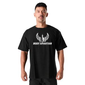 T-shirt graphique oversize noir pour homme en coton épais, coupe ample, col rond, style streetwear urbain, haut décontracté et tendance - Product Image 1