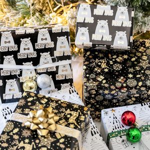 Rotolo di Carta da Regalo Natalizia Mini 43 cm x 305 cm, 3 Diversi Design con Orso Nero e Oro, 42,3 Piedi Quadrati Totali, Carta da Imballaggio - Product Image 1