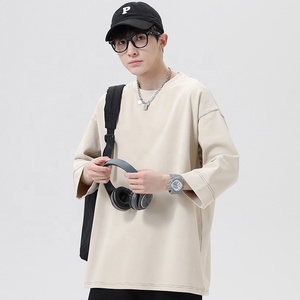 Camiseta unisex de mezcla de algodón con costuras en contraste, manga tipo brazalete, hombros caídos, cuello redondo, camiseta de manga tres cuartos para hombre y mujer - Product Image 4