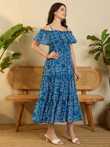 Robe à bretelles à volants imprimée bleue personnalisée, tenue décontractée pour le travail et les activités de plein air, disponible au meilleur prix de gros - Product Image 5