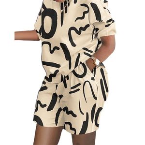 Ensemble 2 pièces décontracté d'été pour femme : T-shirt uni et short au-dessus du genou, à volants, respirant et écologique - Product Image 1