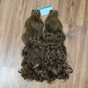 Precio al por mayor Extensiones de cabello humano vietnamita 100% natural, ondulado, virgen, sin procesar, gran cantidad en stock, sin caída ni enredos - Product Image 1